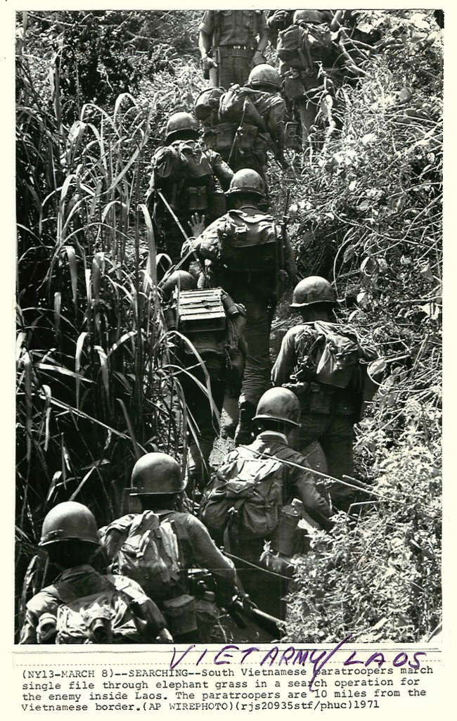 soldiers are coming up the side of a hill