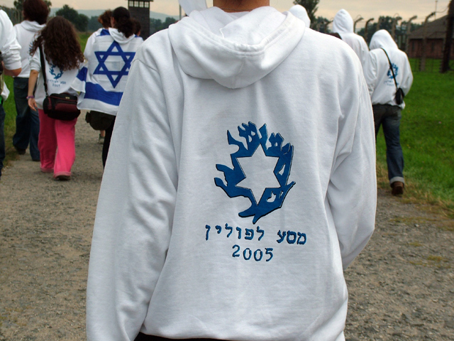 the hoodie with a large israeli symbol on it is white
