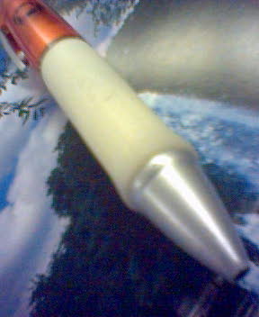 a pen on a snow covered surface