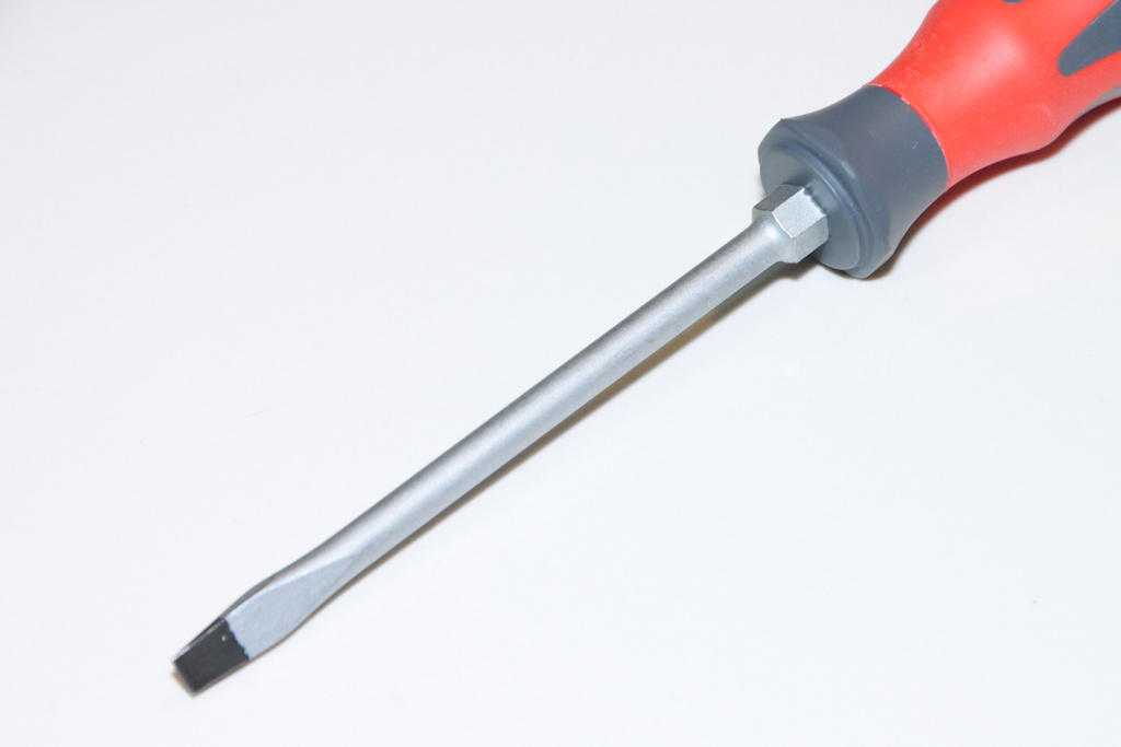 the tool has long handle for holding a large screwdriver