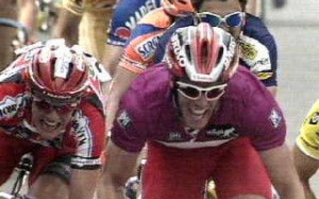 several bicyclists in a racing event with helmet and goggles