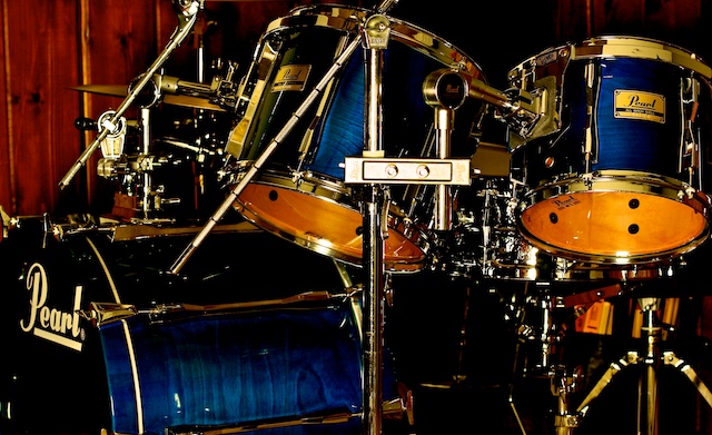 a close up view of two drums and stools