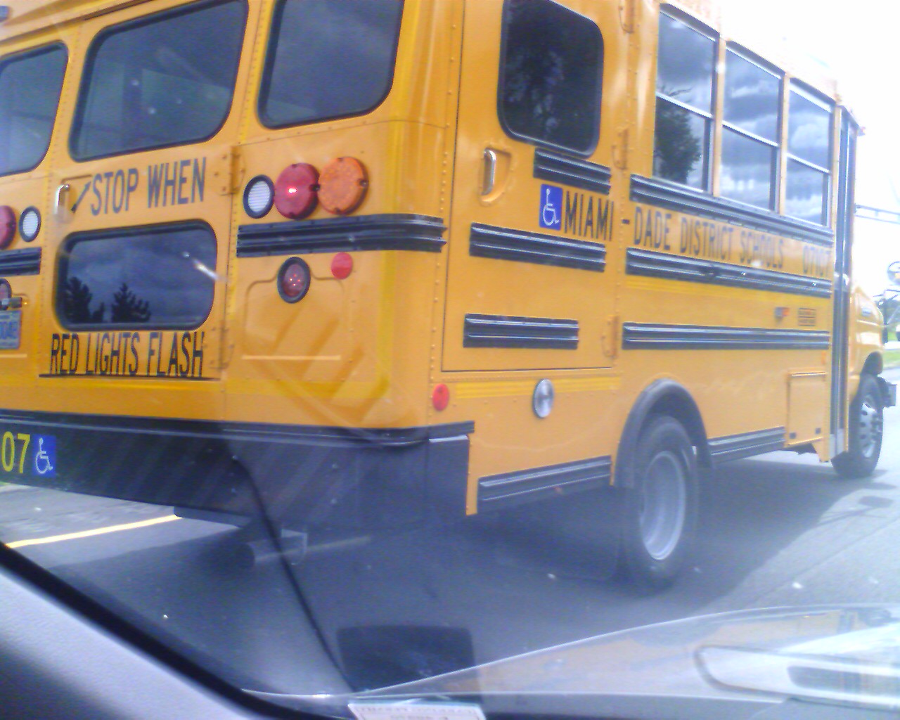 a school bus is shown parked in traffic
