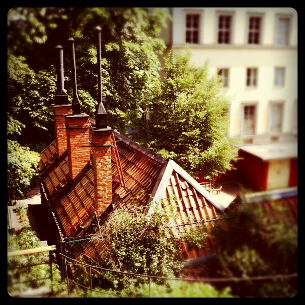 an overhead view of a chimney in the city