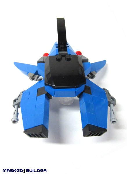 a lego figure with a black face and blue legs