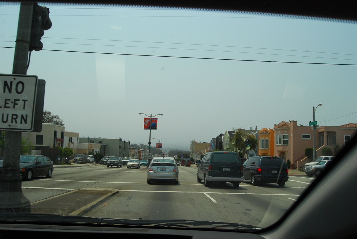 a view from inside a vehicle looking at traffic