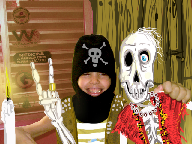 a boy with a skull and skeleton mask on holding two toothbrushes