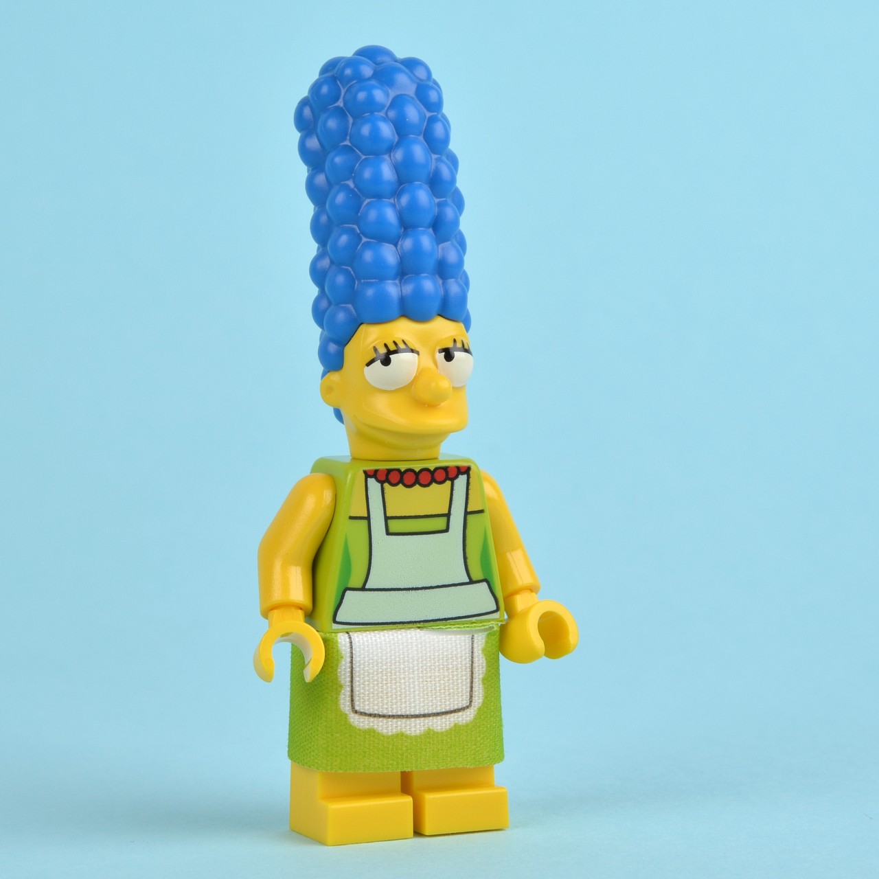 a lego simpsons with blue hair and apron