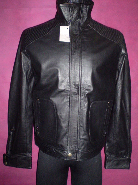 a close up view of a black jacket with a price tag