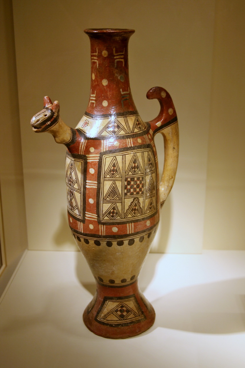 the vase is made up with a pattern on it