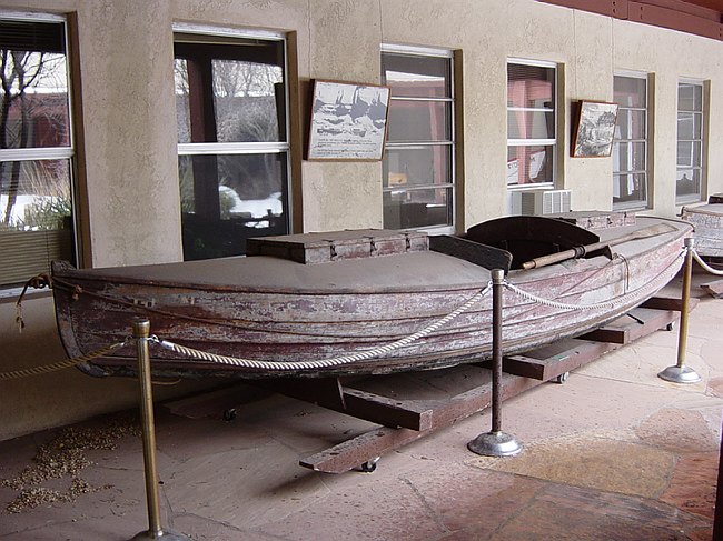 an old boat is on display in a building