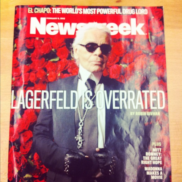 a picture of a man in sunglasses on the cover of newsbreak magazine