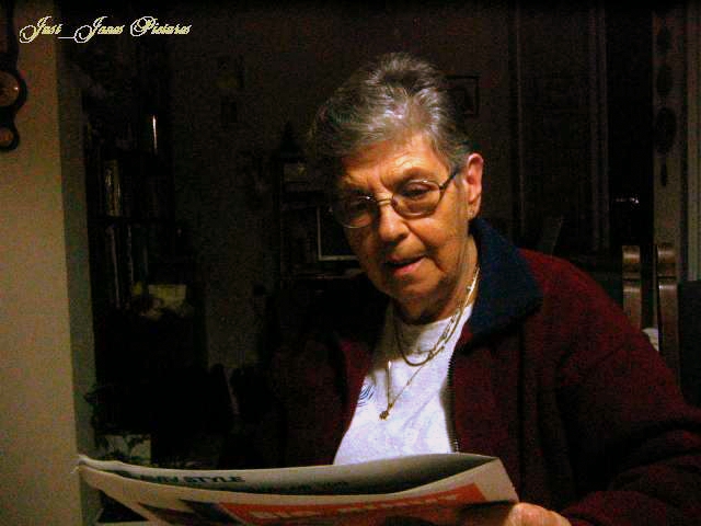 a person that is reading a newspaper