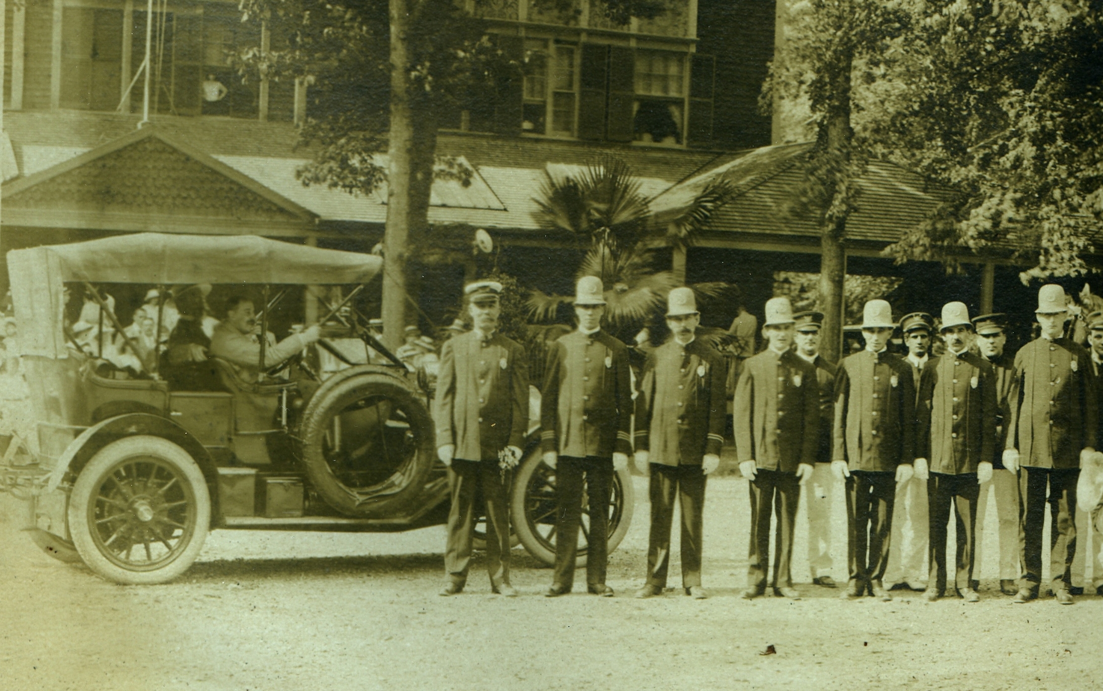 an old time group pograph shows men standing in a row