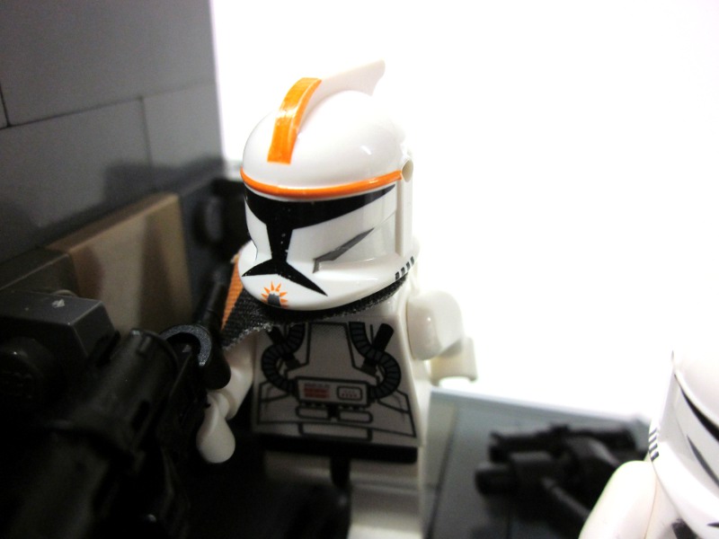 a small lego lego trooper in a room