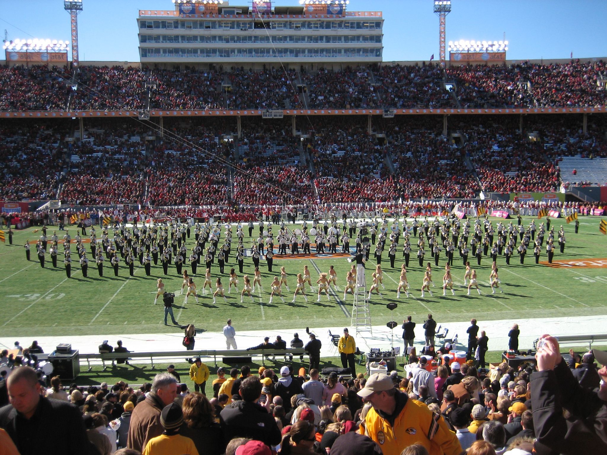 an aerial po of an o's marching team performing in front of the stadium