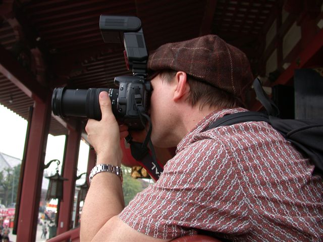 a man taking pictures with his camera