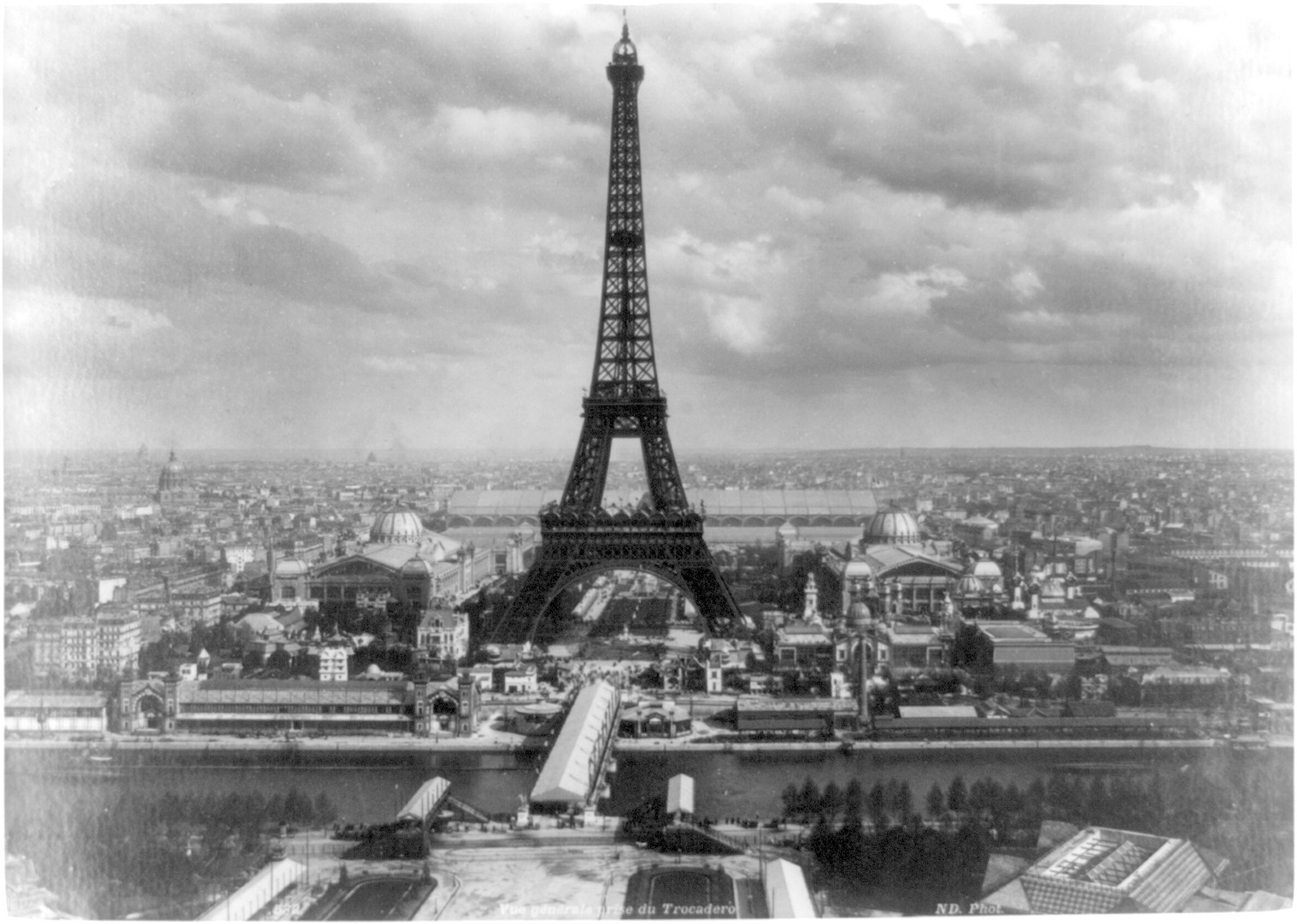 a vintage black and white pograph of the eiffel tower