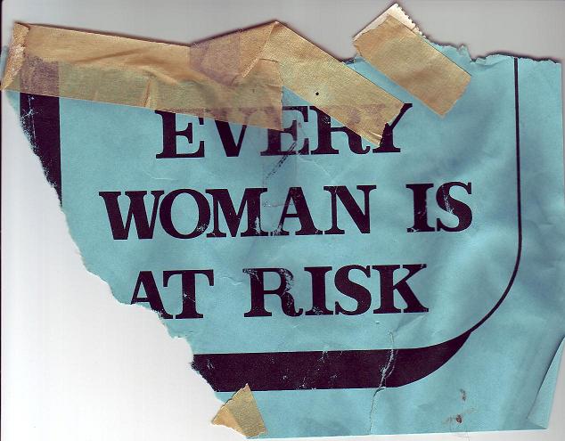 torn paper sign with message of every woman is at war