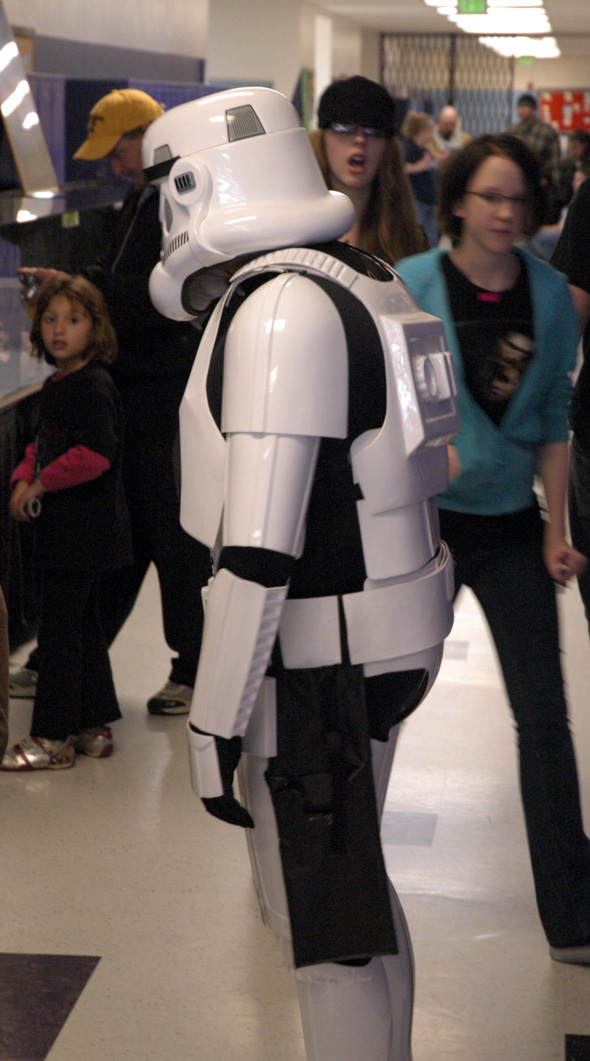 a group of people in costumes are standing around