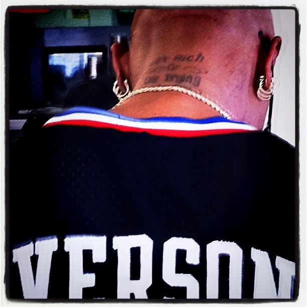 back of a male wearing an nfl shirt