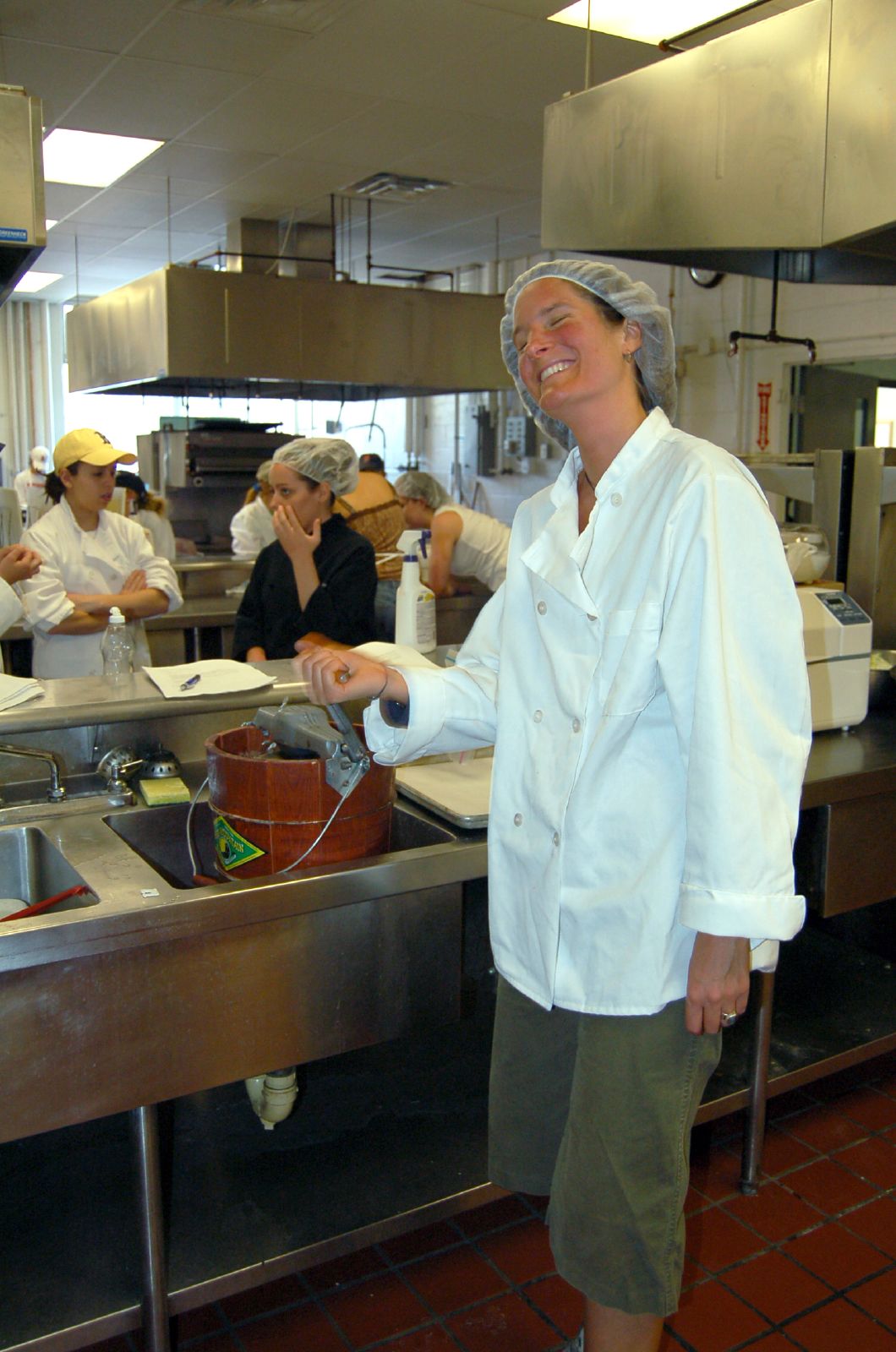 a chef preparing meals in a commercial kitchen