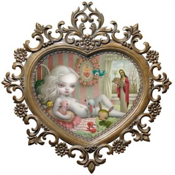 an ornate heart shaped metal plaque with a girl and her baby