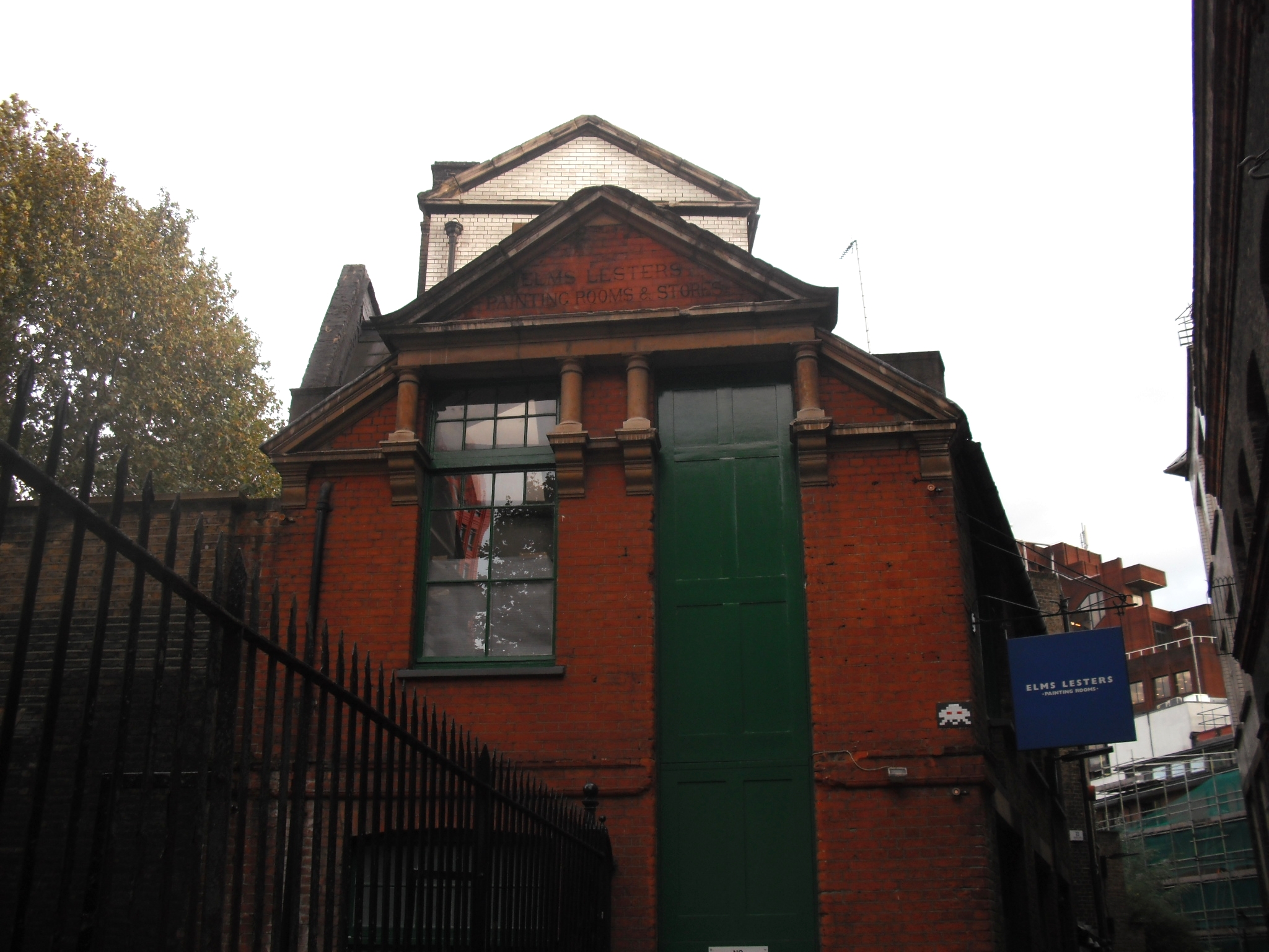 a green door on a large building