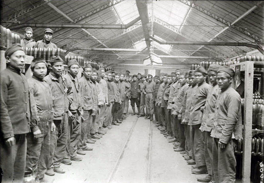 an old po of a group of men standing in a line