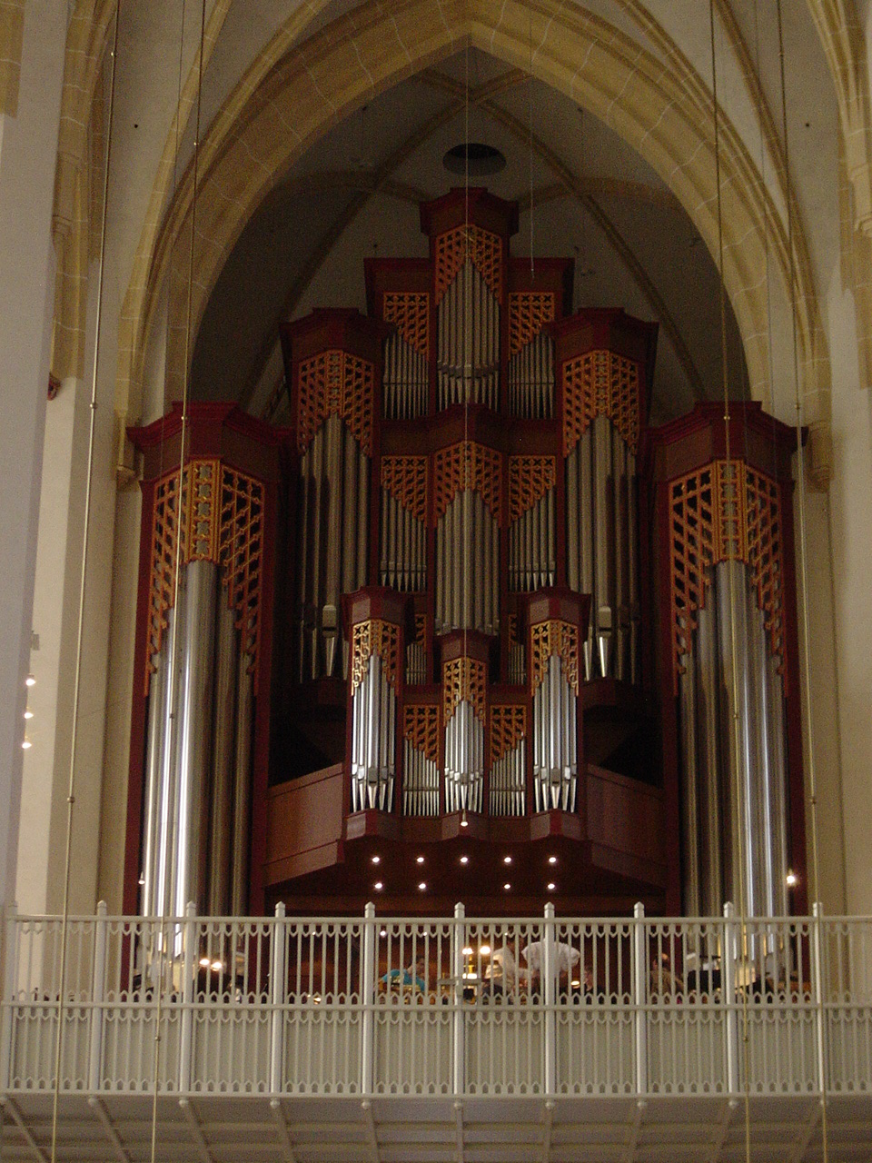 the pipe organ is displayed in a large building