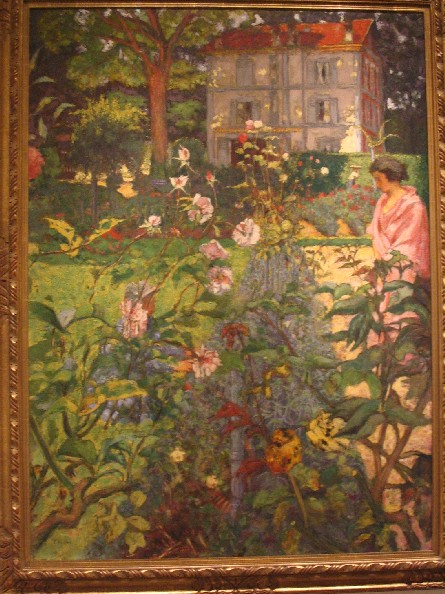 painting of woman in garden with cottage