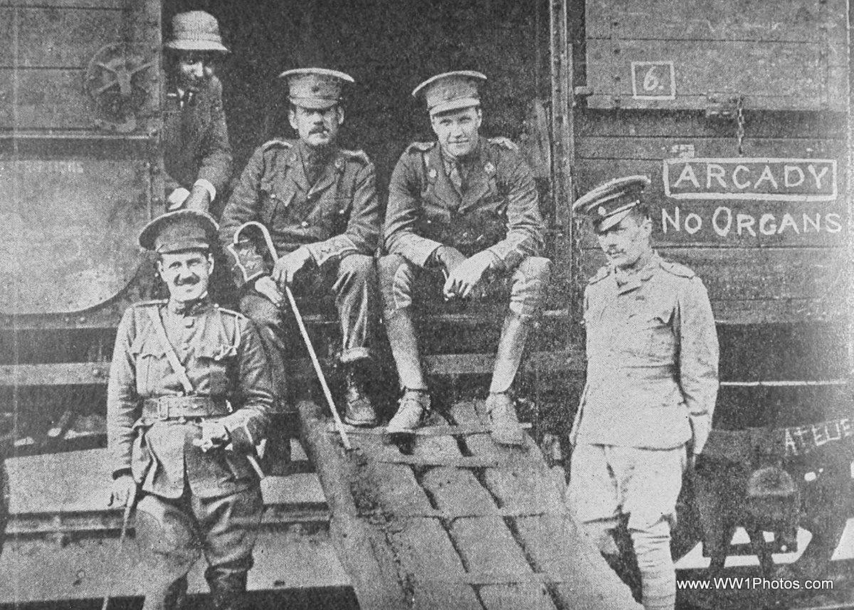 soldiers pose for a picture in a coal mine