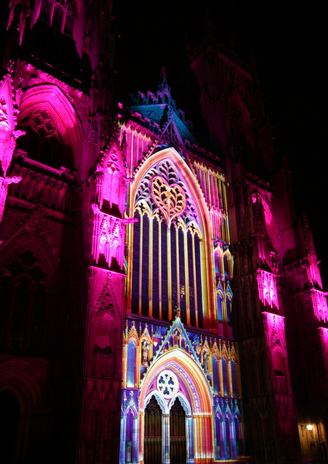 a large cathedral lit up with colored lights