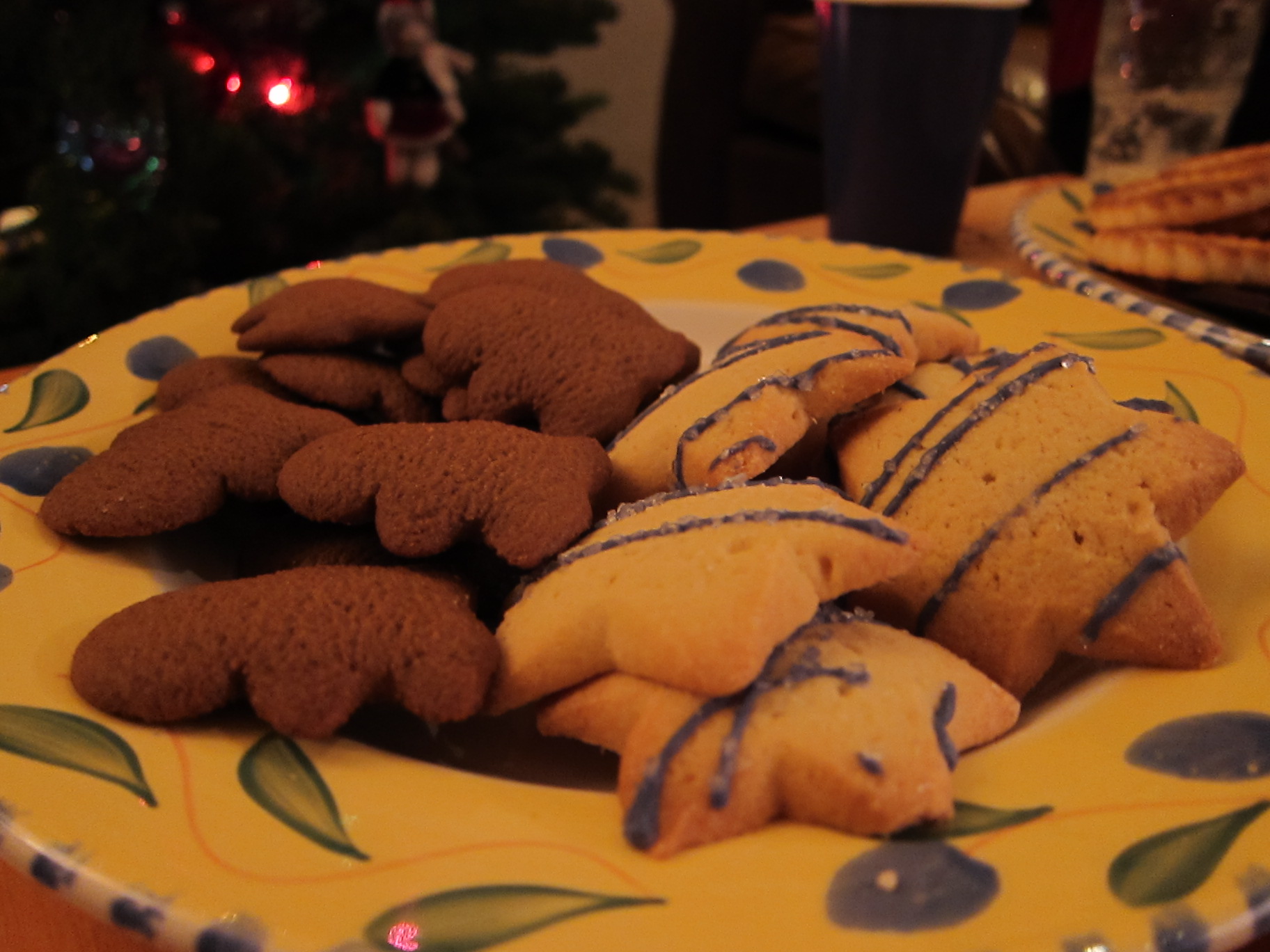 some cookies are sitting on a yellow plate