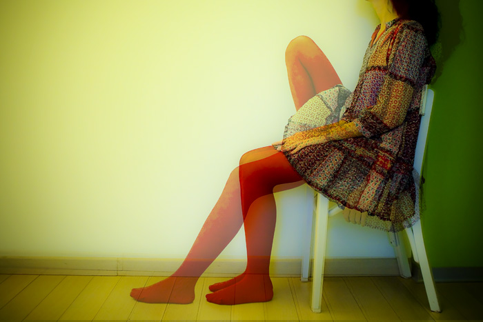 a woman with long legs and a red socks