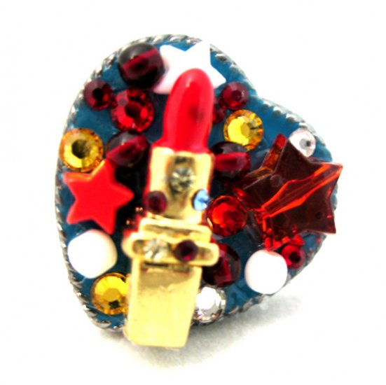 this is an image of an old ring with jeweled charms on it