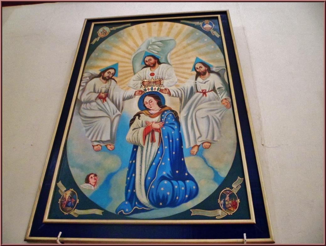 a painting depicting the three marys on a wall