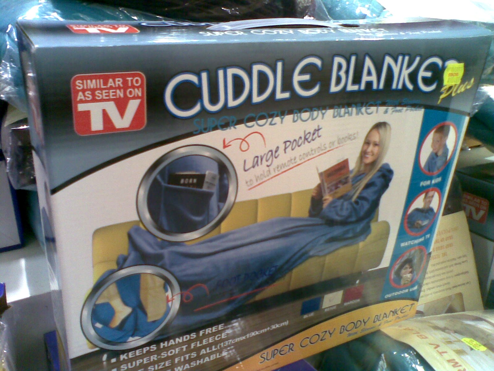 a cardboard box that contains an electric cuddle blanket