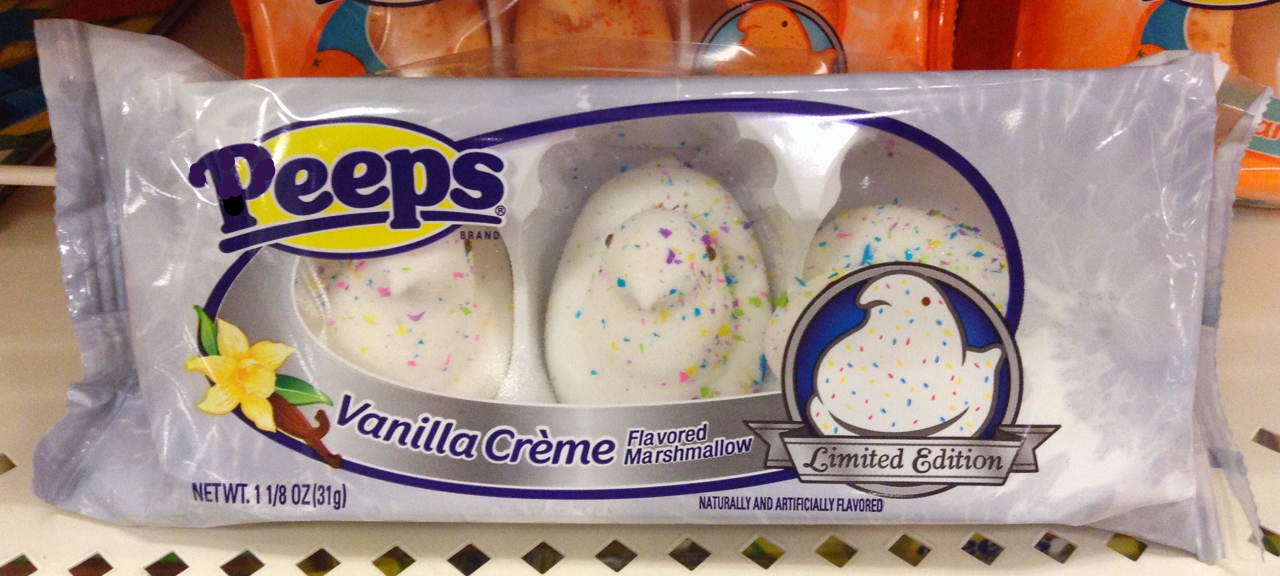 several pees cookies packaged in a bag on a shelf