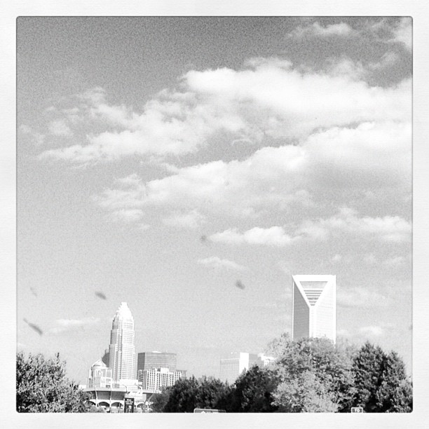 a black and white po of a city skyline