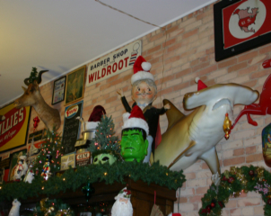 christmas decorations are shown on a brick wall