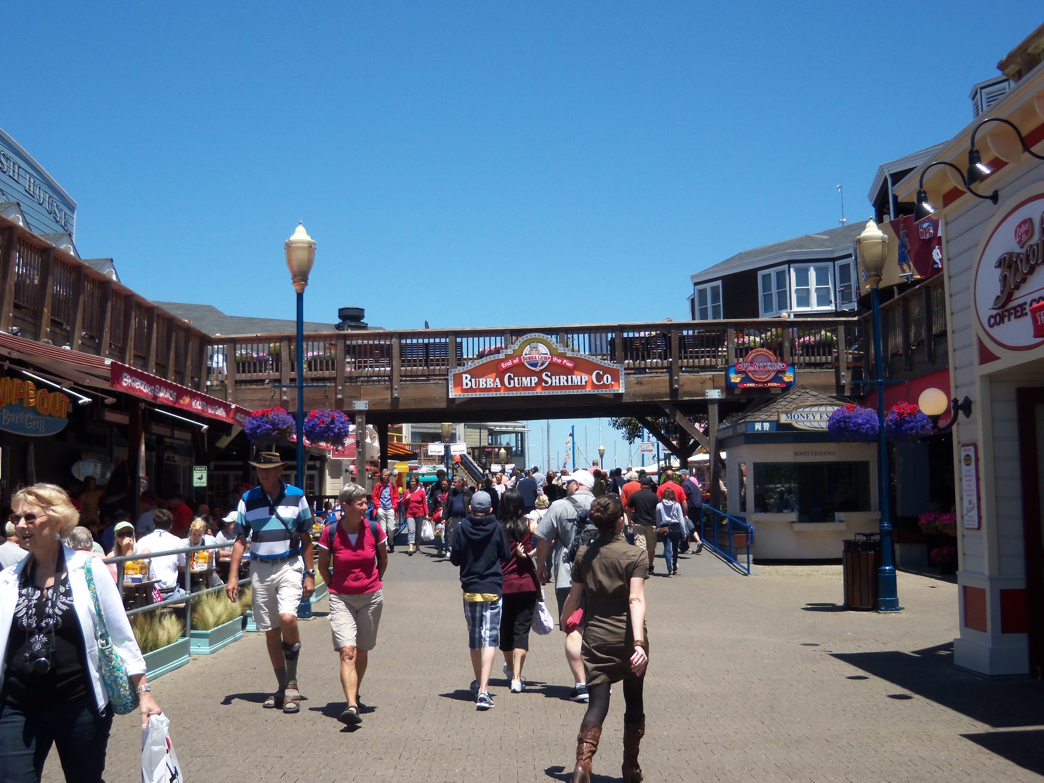 there are many people walking down this street