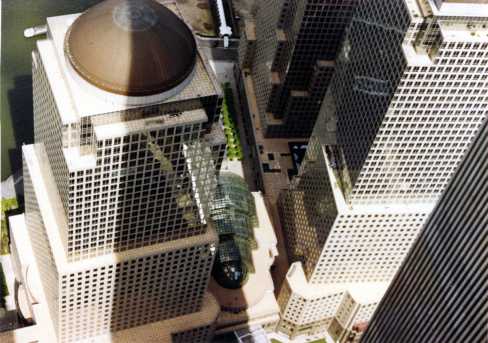 two high rise buildings stand near one another