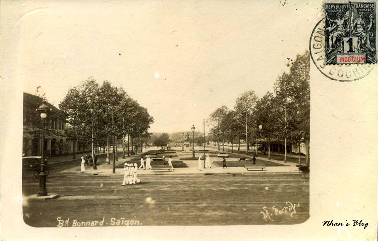old black and white pograph of a park in a city