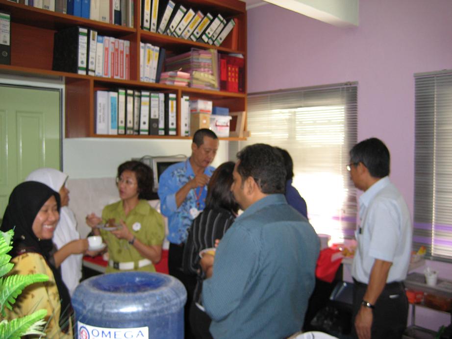 a group of people that are standing around