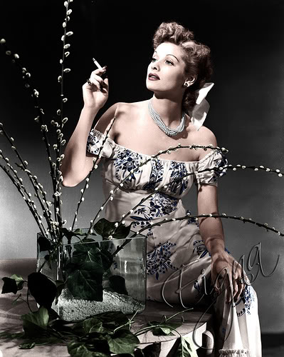 a black and white image of a woman with a cigarette