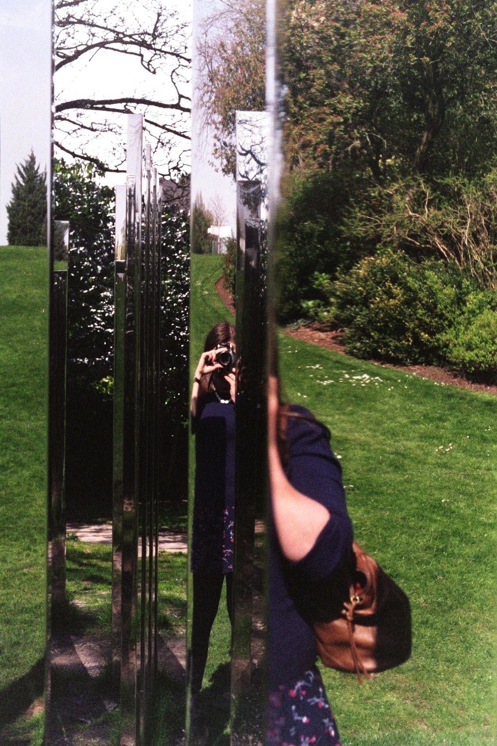 a person is taking a picture in a mirror