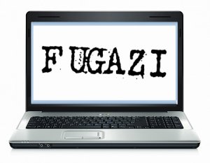 a laptop with a fugazi logo on the screen