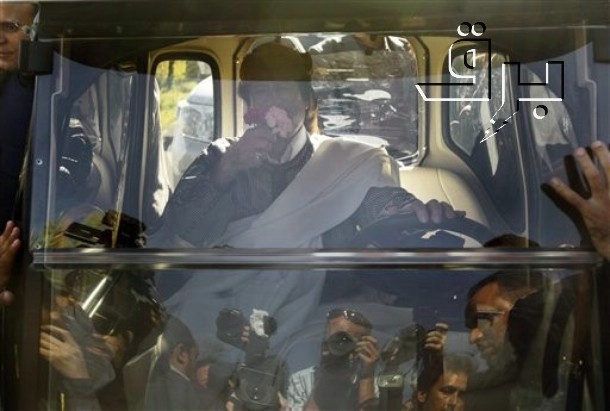 a bus filled with people taking pictures