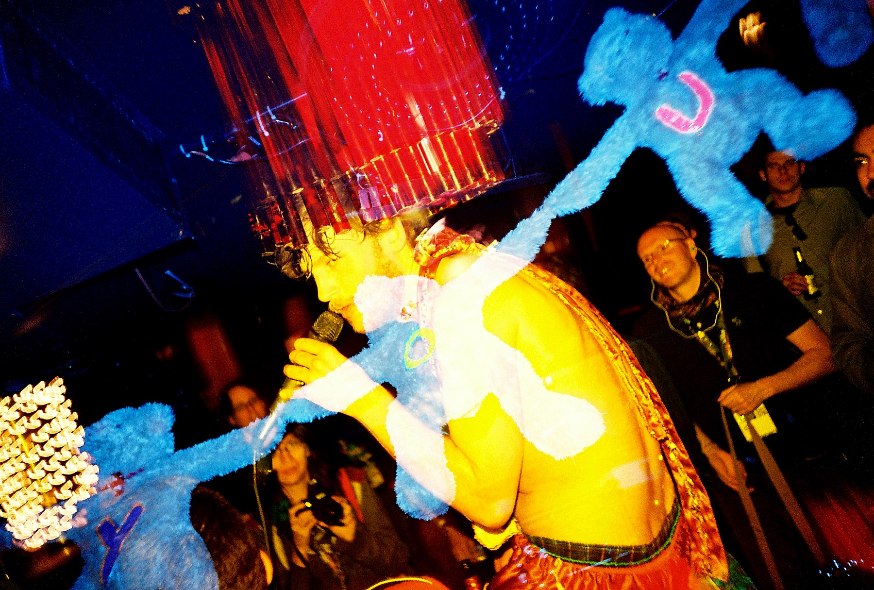 an image of a man dancing with blue decorations
